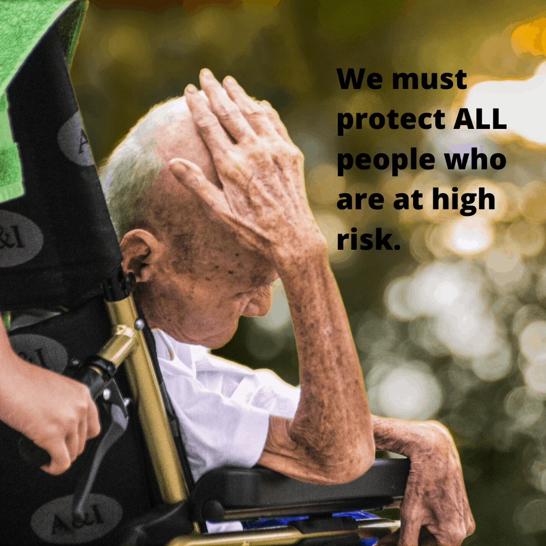 man in wheelchair with head in hand, text says we must protect all who are at high risk