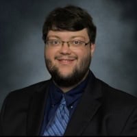 A headshot of Mason Smith.