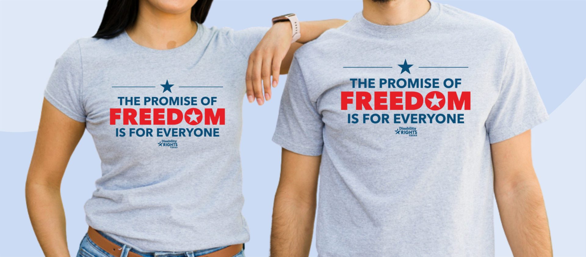 Two models wearing a t-shirt that says the promise of freedom is for everyone.