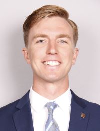 A headshot of Reed Hammond.